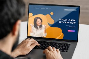 A man using a Payday Loans website.